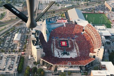 Flyover above a sold-out Memorial Stadium set up for Volleyball Day in Nebraska
